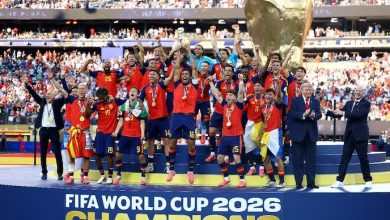 Photo of Donald Trump refuses to leave podium in awkward moment as Spain lift World Cup